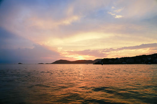 夕阳下的海景图片素材免费下载