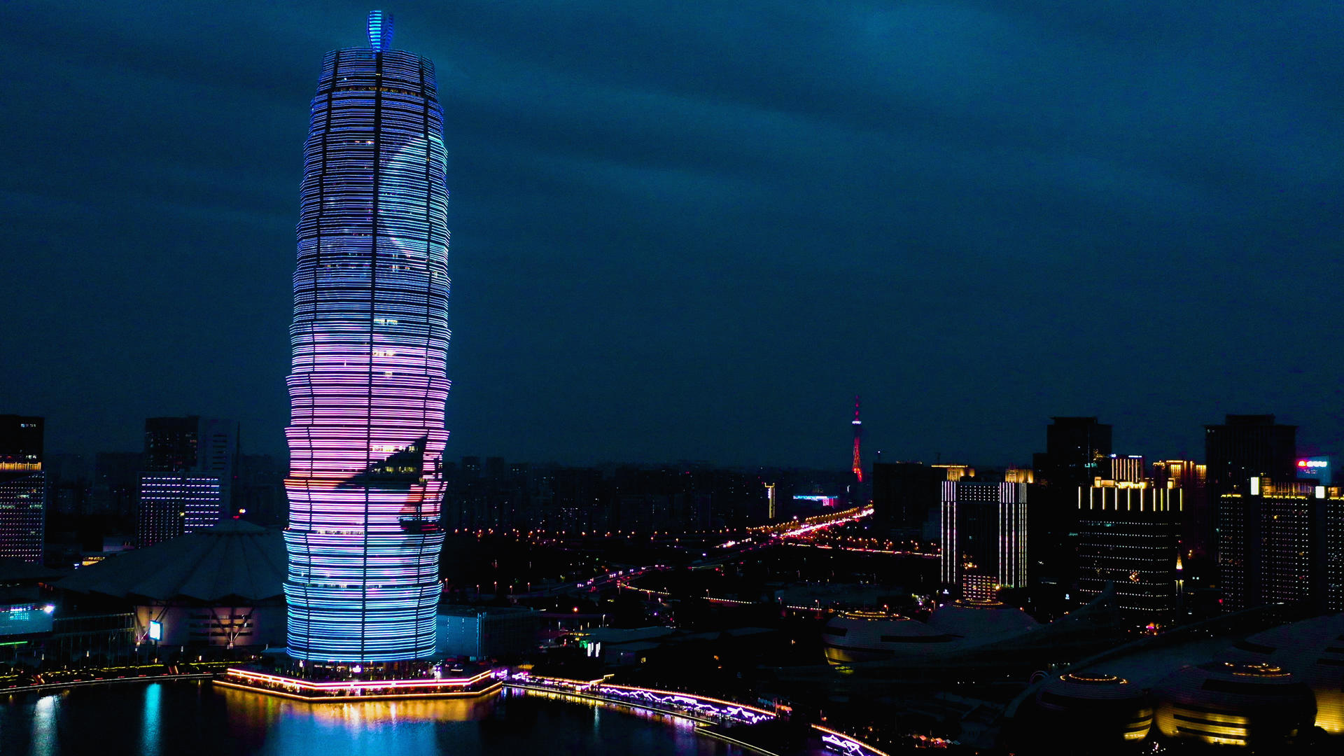 4k航拍河南郑州夜景玉米大楼建筑视频的预览图