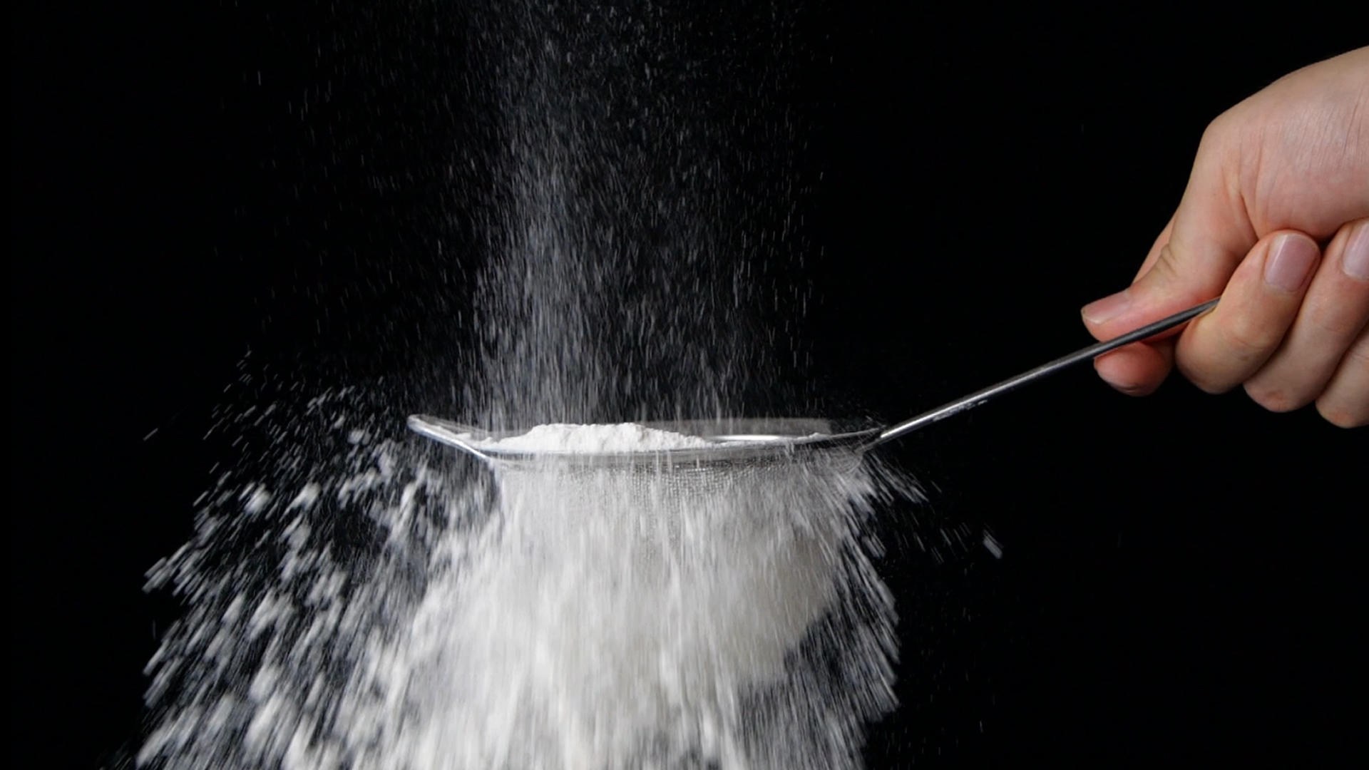 升格面粉筛面粉慢动作小麦粉视频的预览图