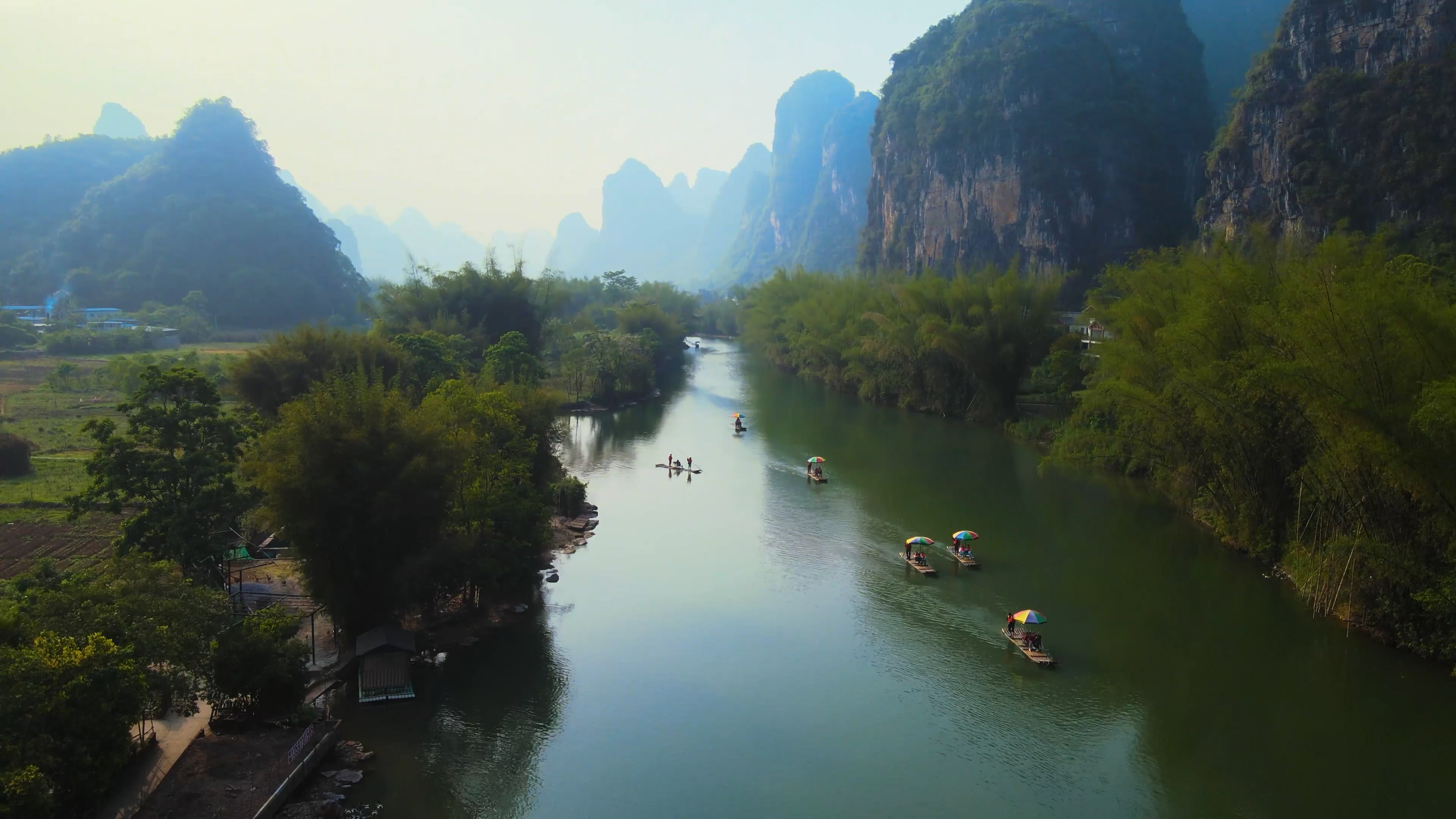 4k广西桂林遇龙河竹排漂流风光水墨山水旅游景区实拍视频视频的预览图