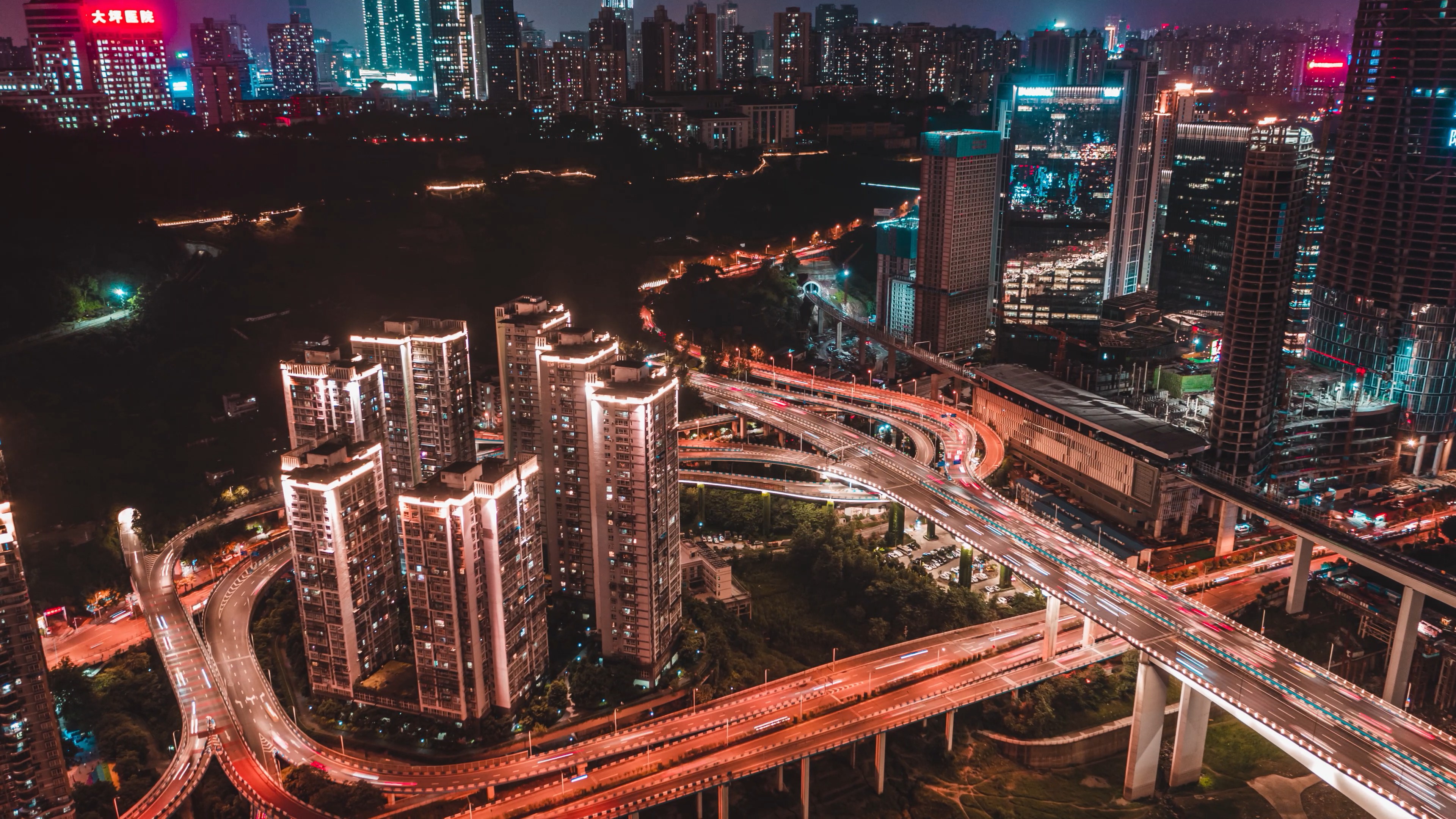 4k航拍重庆华龙桥CBD华村立交车流夜景延时摄影视频的预览图
