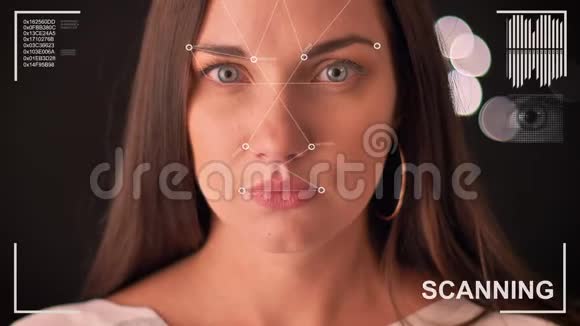 对一位美丽女性的面部进行未来主义和技术扫描以进行面部识别和扫描视频的预览图