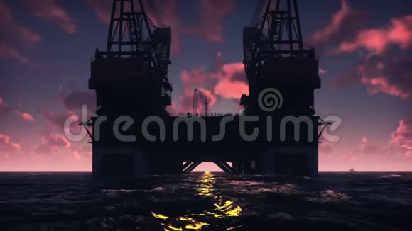 石油平台海上平台或日落时在夜海的海上钻井平台真实的电影动画视频的预览图