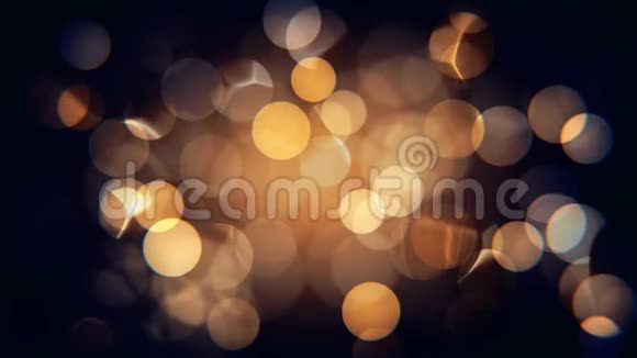 抽象的模糊的节日黄色和橙色圣诞灯与bokeh视频的预览图