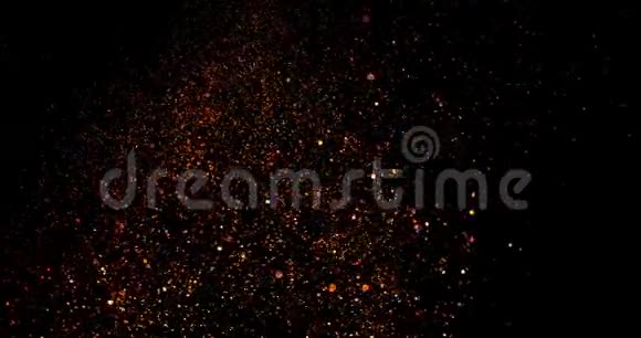 圣诞节红色和金色渐变闪闪发光爆炸尘埃粒子背景与波克流动运动节日快乐视频的预览图