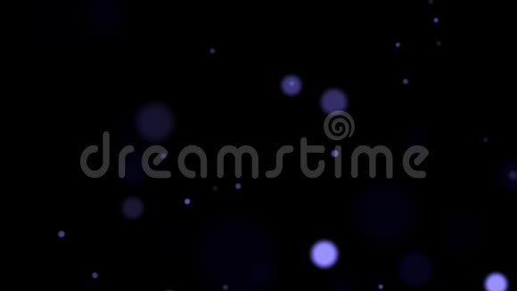 抽象的背景粒子蓝色波克灯闪烁在黑暗的背景上闪烁视频的预览图