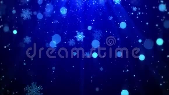 圣诞节背景运动图形镜头蓝色主题闪烁的粒子雪花飘落和闪耀的灯光循环视频的预览图