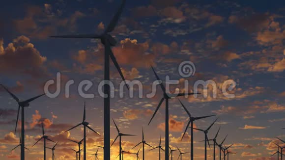 在一个美丽的阴天日落上生产能源的农场风车视频的预览图