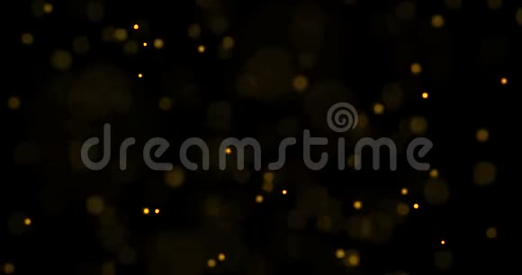 圣诞节金光闪闪的粒子在黑色上盘旋新年快乐圣诞节庆典视频的预览图