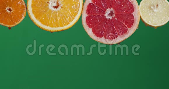 用圆形的不同的柑橘滴汁视频的预览图