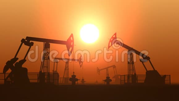 在沙漠中工作的油泵千斤顶在日落时分开采原油视频的预览图