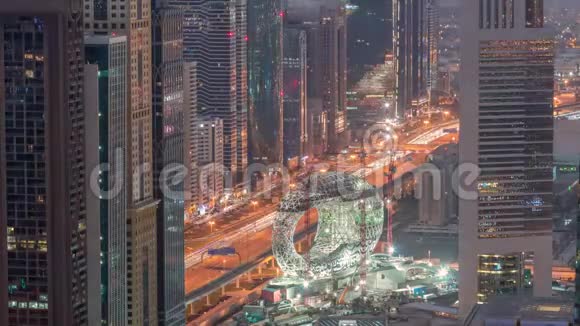建筑工地的未来博物馆空中夜晚到白天时间下一个标志性建筑迪拜视频的预览图