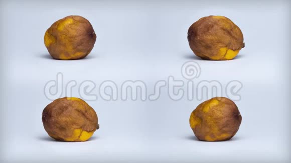 4个皱巴巴的柠檬绕轴旋转停止运动视频的预览图