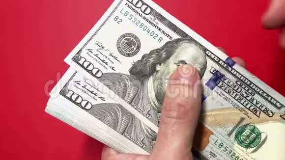 数着100美元钞票实时全高清视频镜头视频的预览图