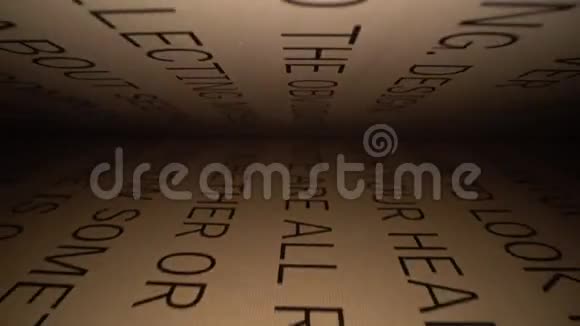 多利的镜头在书中滑动字母拉丁字母和单词在一本黑色戏剧开放的书上视频的预览图