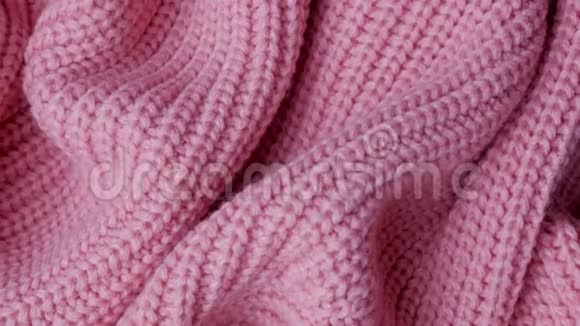粉色针织面料为背景宏观经济视频的预览图
