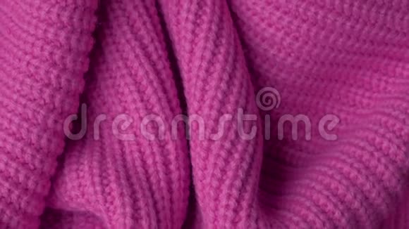 粉色针织面料为背景宏观经济视频的预览图
