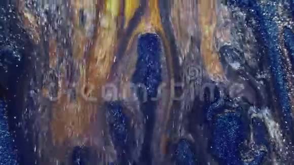 液体油漆纹理闪烁蓝色黄色视频的预览图