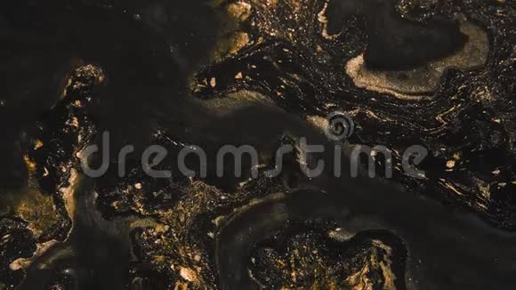 闪光漆流动黑青铜流体混合运动视频的预览图