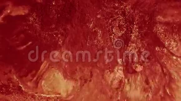 液体油漆纹理闪红橙色墨水视频的预览图