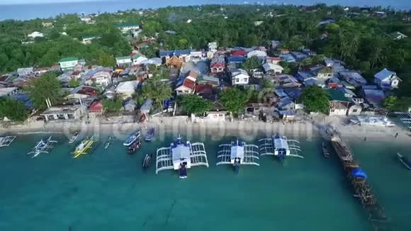 菲律宾宿务马拉帕斯卡岛海滨的Logon海滩和船背景V的苏鲁海船和美丽海景视频的预览图