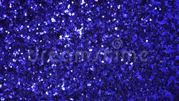 蓝色和银色抽象的bokeh灯闪亮的背景新年和圣诞节的概念闪烁的贺卡视频的预览图