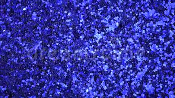 蓝色和银色抽象的bokeh灯闪亮的背景新年和圣诞节的概念闪烁的贺卡视频的预览图