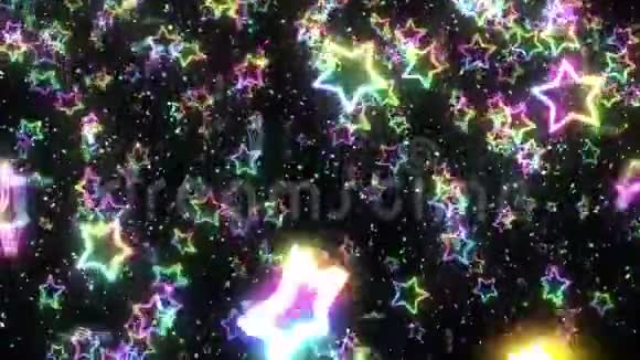 彩虹星坠落闪闪发亮的星星多种颜色抽象的彩虹图案黑色背景循环动画视频的预览图