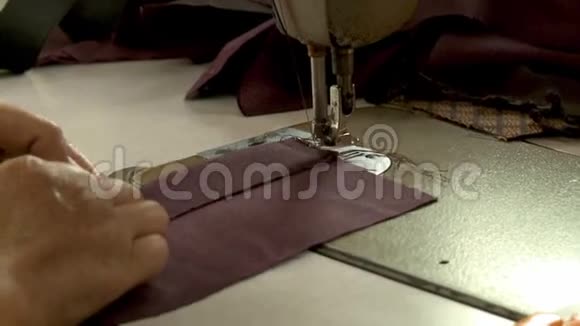 缝纫机上的缝纫织物视频的预览图