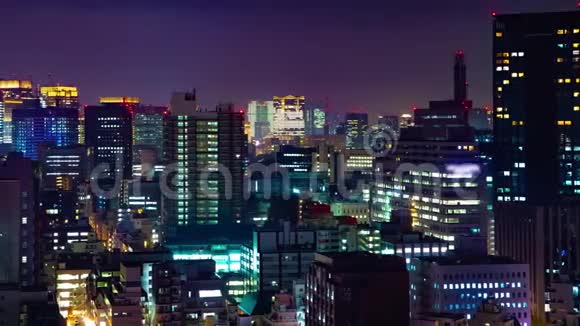 东京市区城市景观的一个夜间时间推移中拍视频的预览图