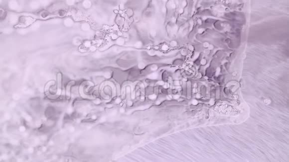 淡粉色薰衣草色颜料流抽象背景画面视频的预览图