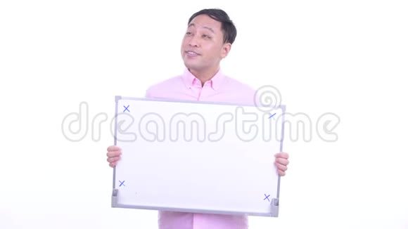 快乐的日本商人拿着白板思考视频的预览图