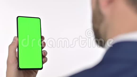 商人解锁智能手机与色度屏幕白色背景视频的预览图