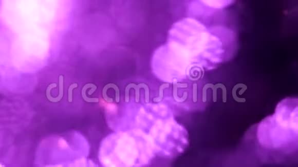 很大的背景紫色或紫色离焦圆形相视频的预览图
