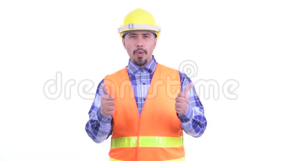 快乐留胡子的波斯人建筑工人竖起大拇指看上去很兴奋视频的预览图