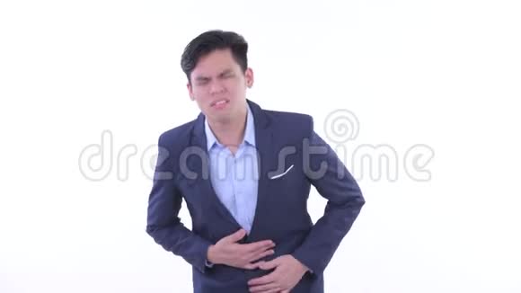 穿着衣服的年轻亚洲商人胃痛视频的预览图