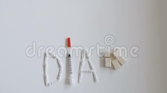 由胰岛素注射器柳叶刀和糖块组成的DIA视频的预览图
