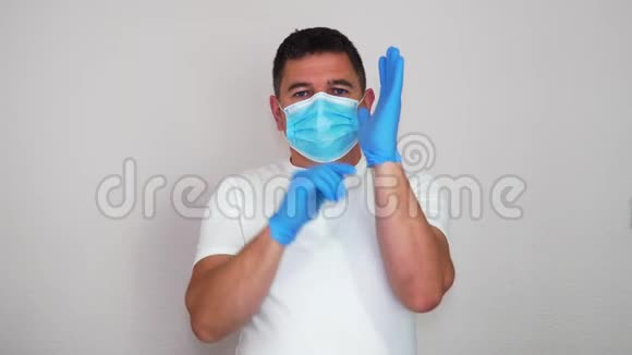 手册如何移除手套和口罩以避免感染冠状病毒COVID19防止感染视频的预览图