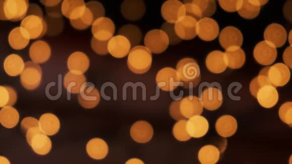 模糊的橙色圣诞波克照明挥动抽象粒子背景视频的预览图