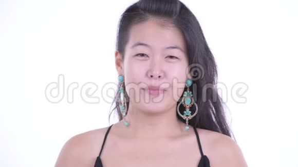 一张快乐美丽的亚洲女人的脸准备聚会视频的预览图