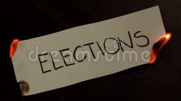 写在白纸上的选举词带着烟雾和灰烬的火焰视频的预览图