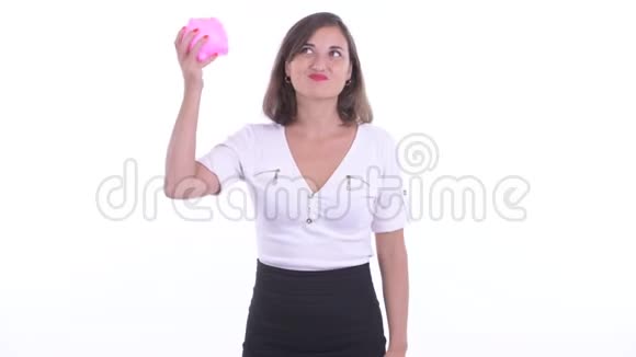 女商人拿着储蓄罐竖起大拇指视频的预览图