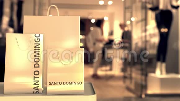 带有SantoDomingo标题的纸质购物袋防止模糊的商店入口多米尼加共和国3D零售视频的预览图