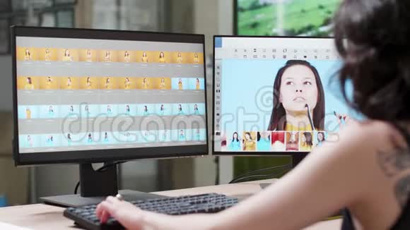 专业女摄影师使用专业编辑软件视频的预览图
