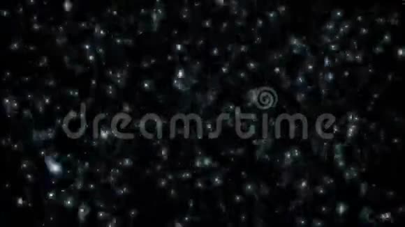 抽象运动背景闪耀着雪一样的蓝色粒子星星在4k的无缝环路中随机运动视频的预览图