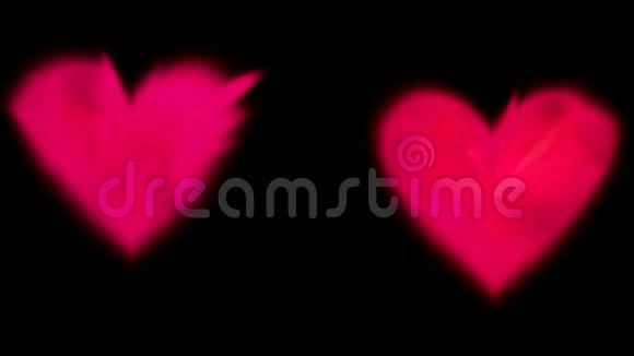浪漫的叠加两片霓虹炽热的粉红色发光的心视频的预览图