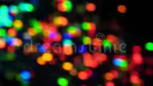 彩色的bokeh灯闪闪发光闪亮的模糊灯光抽象粒子背景视频的预览图