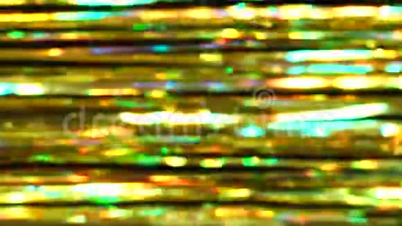 抽象的水平光泽背景从金箔散焦bokeh强光下的动态背景视频的预览图