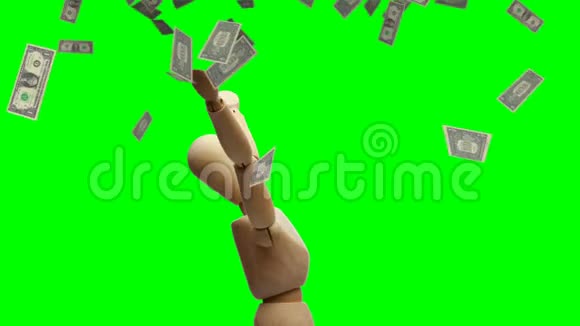 木制的人体模型在美元的雨水下旋转着兴奋的双手绿色的屏幕画面视频的预览图