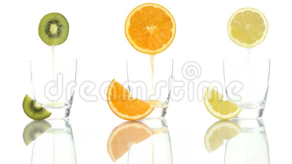 果汁橙柠檬奇异果倒入玻璃视频的预览图